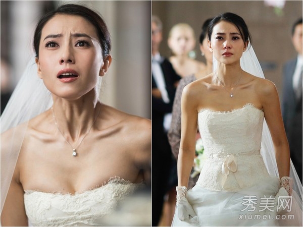 《单身男女2》中高圆圆提着婚纱流泪